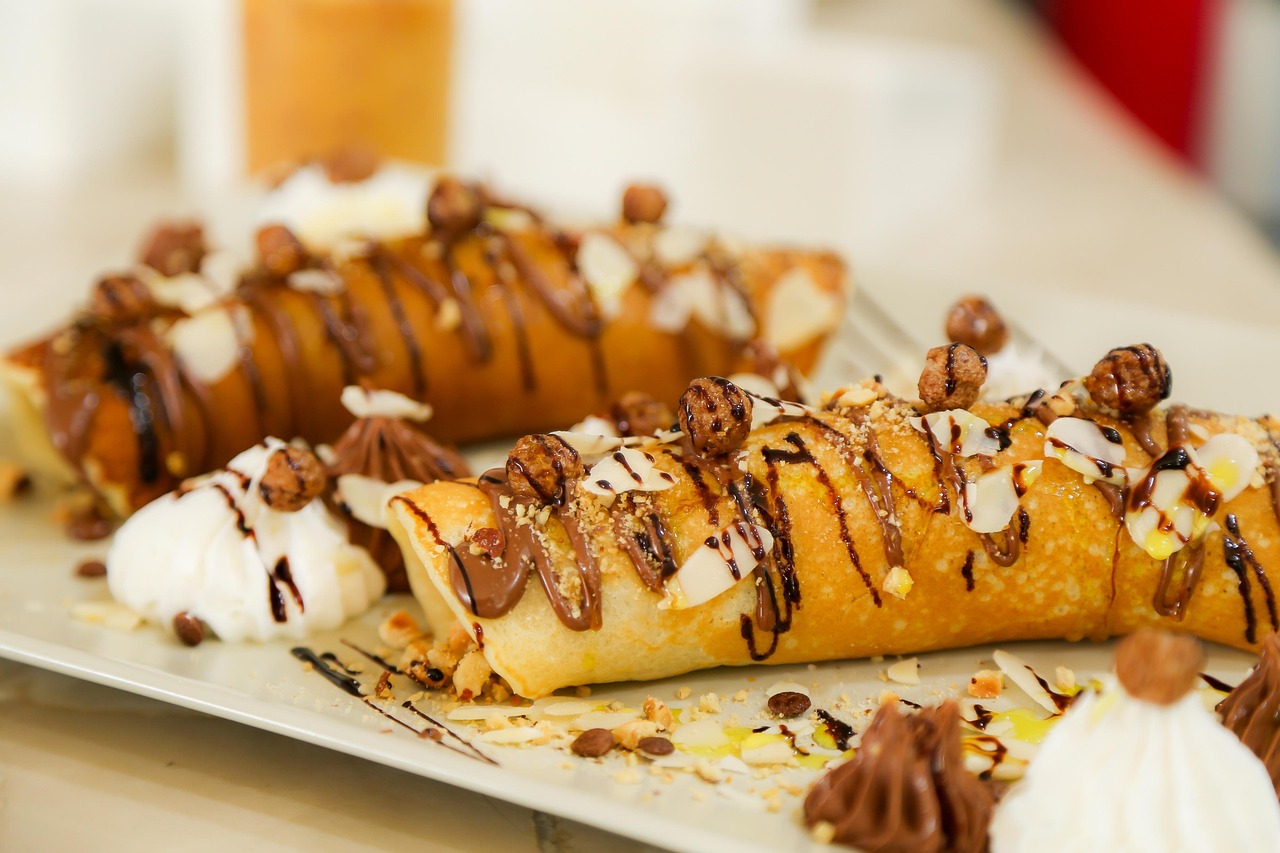 Crepes alla nutella perfette, morbide e senza rotture, pronte per essere gustate.